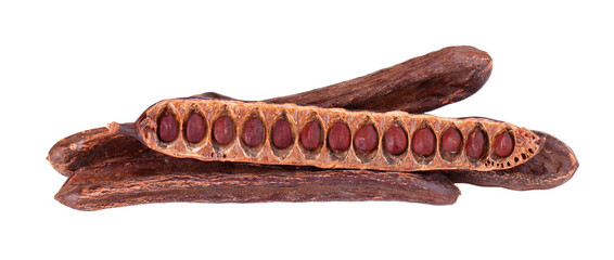 Ripe carob pods and bean isolated on white background.