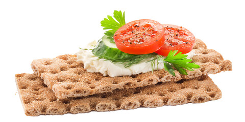 Two Slices of Crispbread with soft cottage cheese and slices of red tomatoes and cucumbers with