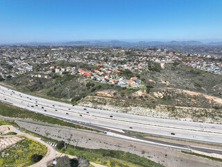 Aerial view of highway transportation with small traffic, highway interchange and junction, San Diego Freeway interstate 5, California