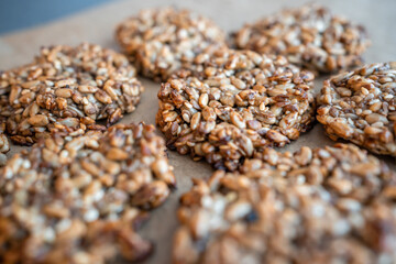 Vegan cookies made of banana and different seeds, photographed with natural light