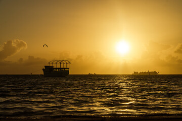 View on golden sunrise over the islands on the bank east of San Andres, Colombia