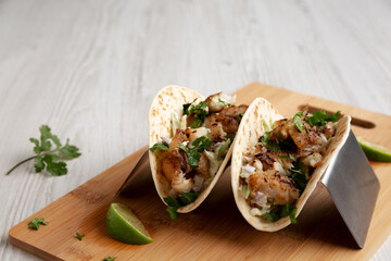 Homemade Fresh Fish Tacos, side view. Copy space.