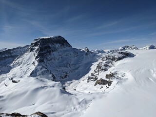 Fototapeta na wymiar View of the piz russein from the gemsfairenstock in the canton of uri. Ski mountaineering on the glaciers. High quality photo