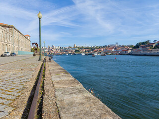 View over the Douro at the Alfandega conference center, river in Porto, Portugal. Image taken on a sunny day in April.