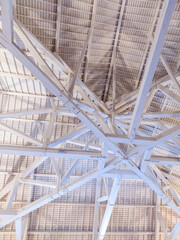 Complicated white, wooden ceiling construction at the Alfandega conference center in Porto, Portugal.