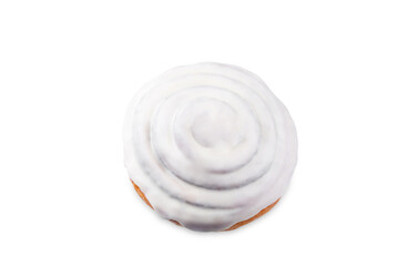 Cinnamon roll bun with cream glaze on a white isolated background