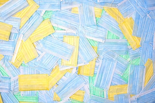 Colorful protective masks on the surface.