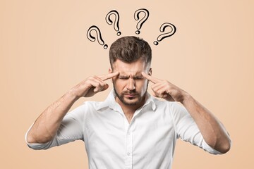 A thoughtful young man with a question mark