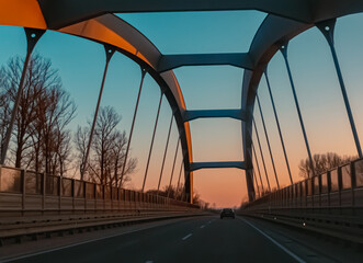 Sunset with a bridge near Plattling, Isar, Bavaria, Germany
