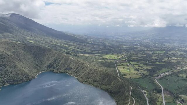 Cuicocha water-filled crater volcano lake  in the Ecuadorian Andes Imbabura Mountains Aerial  Mavic 3 cine drone prores 