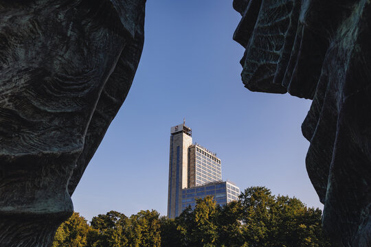 Katowice, Poland - August 25, 2022: Monument to the Silesian Insurgents and Altus building in Katowice