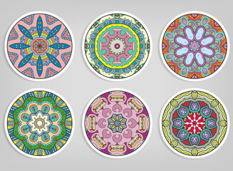 Decorative round ornaments set, isolated elements. Colorful mandala, stylized flower. Abstract geometric doodle patterns for plate decoration, fabric print,  business or greeting card design