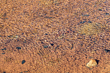 Rippling water in a bauxite mine