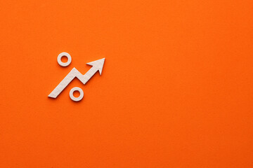 white arrow up on orange color background - Concept of growth or rising, graphic resource for design