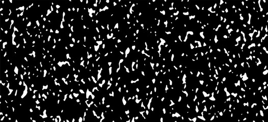 Small uneven spots and particles of debris. Abstract vector texture. Distressed uneven background.  Vector illustration. EPS10.