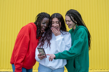 foreign friends autographing with their mobile phones in the street