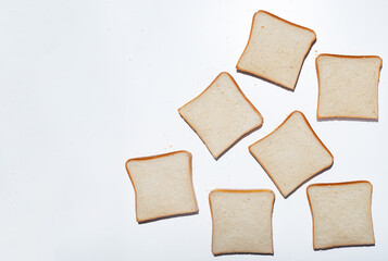 Top view of white toast bread slices with breadcrumbs