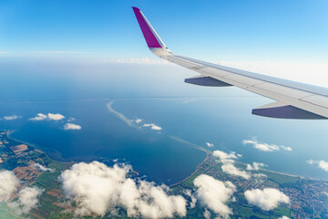 Fototapeta na wymiar View from an airplane window to Baltic Sea