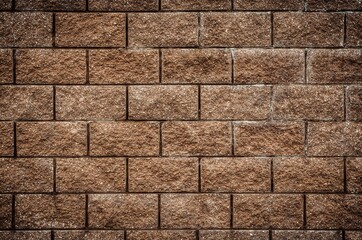 Photo of a brick wall to use as a background. Old brick texture. Brown wall background.