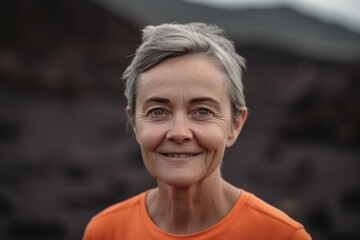 Portrait Of Mature Woman Smiling In Hawaii Volcanoes National Park