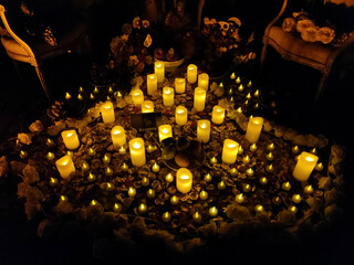 Dozens of candles lit for the Dia de los Muertos