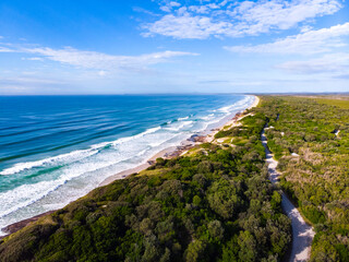 Aerial (drone) view of a spectacularly beautiful long Ten Mile Beach and Pacific ocean, near Byron...