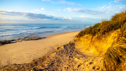 Beautiful wild ten mile beach during late sunrise near Byron Bay. Black rocks campsite, NSW, Australia