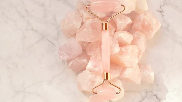Rose quartz massage roller. Beauty devices and gadgets. High quality 4k footage