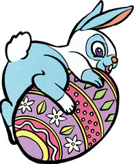 イースターエッグにまたがるウサギ