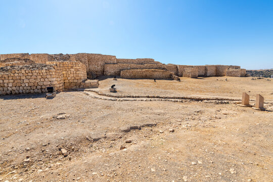 The ruins of the ancient 3rd Century BC fortified port city of Sumhuram, an import harbor for frankincense trade, at Khor Rori, or Khawr Rawri lagoon in the Dhofar region of the country of Oman.	
