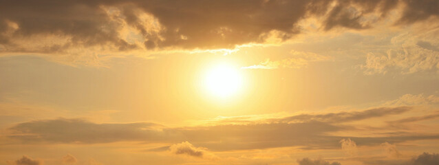 Sun shining on beautiful cloudy sky at sunset, banner design