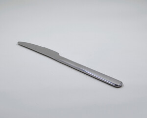 A knife on a white surface