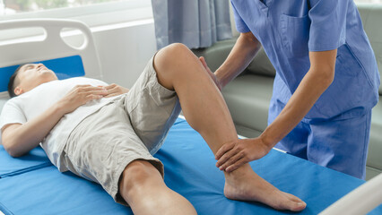Athlete undergoing physiotherapy with a musculoskeletal specialist after sports and gym injuries.