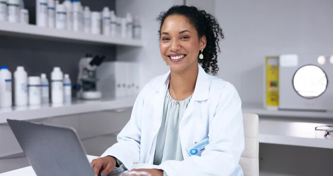 Smile, laptop and face of scientist typing in laboratory for online research or healthcare. Portrait, computer and happy woman, doctor or medical professional with pc for testing, science or analysis