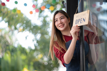 Welcome open shop barista waitress open sign on glass door modern coffee shop ready to serve restaurant cafe, retail small business owners.