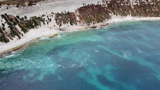 Drone view over Cliffs, the Mediterranean sea, turquoise water on Malta island.