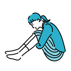 抑うつで膝を抱えて悩んでいる女性
