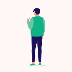 Back View Of A Young Man Using Mobile Phone. Smart Phone. Full Length. Flat Design Style, Character, Cartoon.