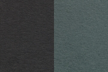 Fototapeta premium Texture of craft black and dark green paper background, half two colors, macro. Vintage dense olive cardboard.