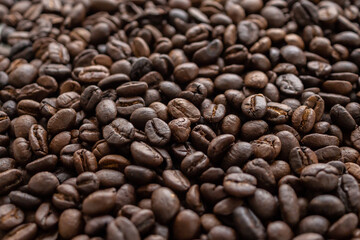 Fresh roasted brown coffee beans background