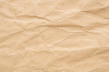 Abstract crumpled and creased recycle brown paper texture background