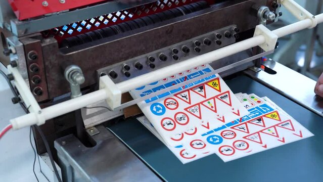 Production Of Self-Adhesive Labels.  Cutting Children's Traffic Rules Stickers