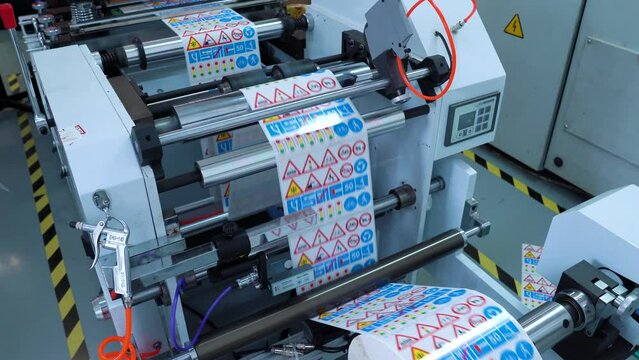 Production Of Self-Adhesive Labels.  Cutting Children's Traffic Rules Stickers