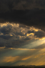 Pipes of a nuclear power plant on the background of a  dramatic sky