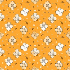 Black flowers pattern on the orange background