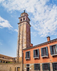 Obraz premium old tower on venetian street in italy