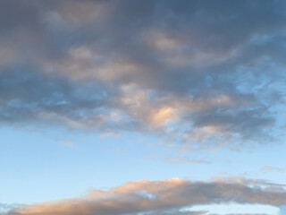 lovely fluffy white clouds in the sky above Sydney NSW Australia at sunset