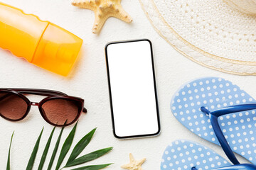 Flat lay composition with Phone and beach accessories on colored background. Smartphone with blank screen mock up with copy space