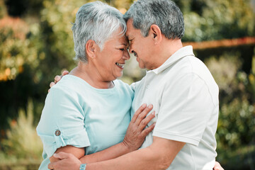 Happy senior couple, face touch and hug in park, garden and peace of care, happiness and love together. Elderly man, woman and retirement of marriage partner, relax or smile of quality time in nature