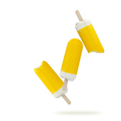 Three tasty yellow ice cream, whole and bitten popsicle with fruit sorbet flying isolated
